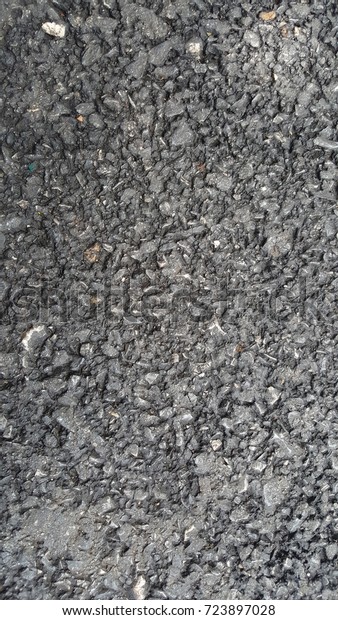 Black Asphalt rough stone\
road