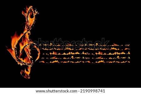 black background with burning treble clef and stave