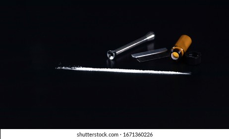 Cocaine on a Black Background, Cocaine Bottle  