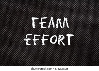 Black background of pattern texture with team effort words