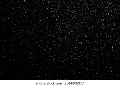 A black background with a lot of small dots. The dots are scattered all over the background