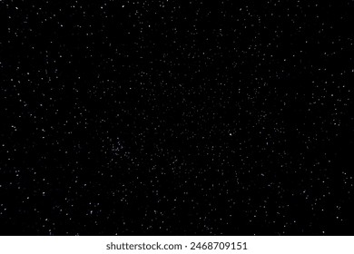 A black background with a lot of stars. The stars are of different sizes and colors. The stars are shining brightly in the dark sky - Powered by Shutterstock