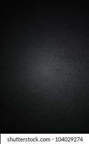 Black background or texture with spotlight