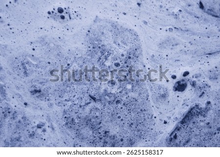 Black background, texture, view of water and land from the other side. Everything ingenious is simple
