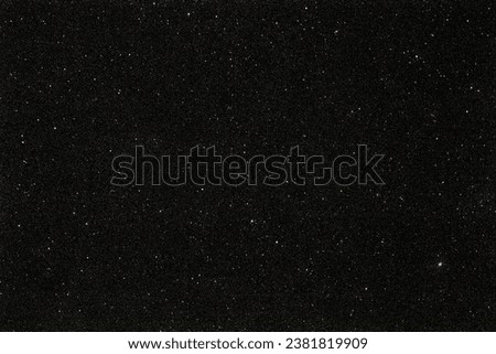 A black background with white dots