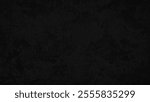 A black background with a white line in the middle. The line is thin and slightly curved. The background is almost completely black, with only a small portion of it showing
