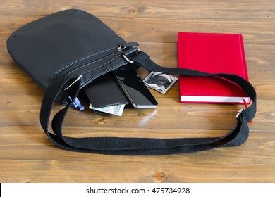 black bag with things in it