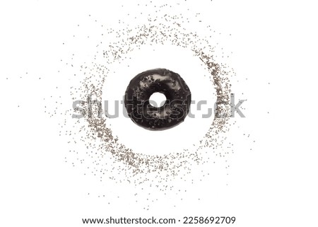 black bagel with poppy seeds isolated on white background