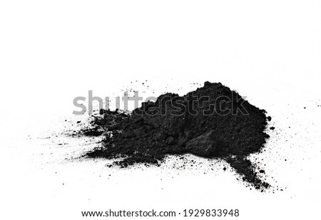 Black bamboo activated charcoal powder isolated on white background