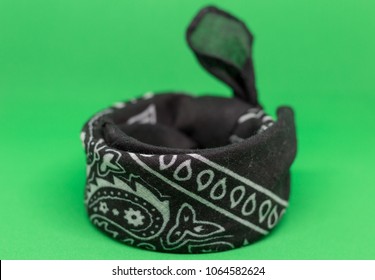 Black Bandana On A Green Background