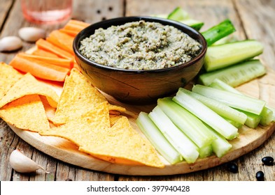 Black Bean Dip With Vegetables And Corn Chips. Toning. Selective Focus