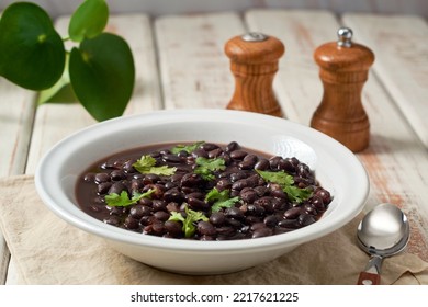 Black Bean Soup In A Bowl On A Rustic Table.