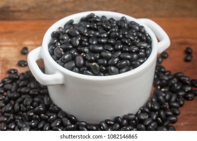 Black Beans In A Bowl Over A Wooden Table