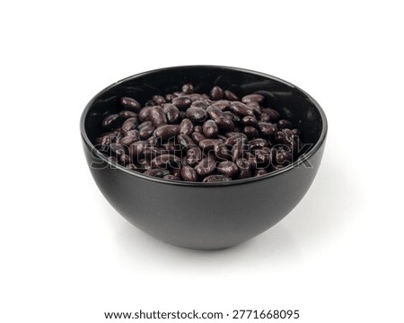 Black beans isolated, cooked bean pile, baked legume, canned beans, dark rajma, Phaseolus vulgaris, leguminous salad ingredient on white background