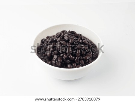 Black beans isolated, cooked bean pile, baked legume, canned beans, dark rajma, Phaseolus vulgaris, leguminous salad ingredient on white background