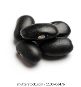 black beans isolated on white background - Shutterstock ID 1100706476