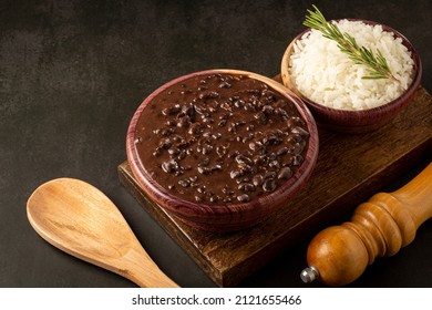 Black Beans And Rice In Wooden Bowl.