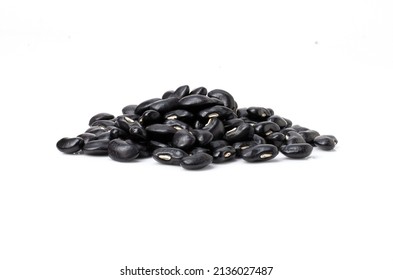 Black beans (Urad dal, black gram, vigna mungo) isolated on white background. 