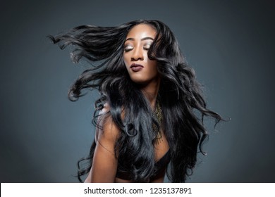 Black Beautiful Woman With Long Luxurious Shiny Hair