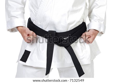 Black belt karate expert with rest position