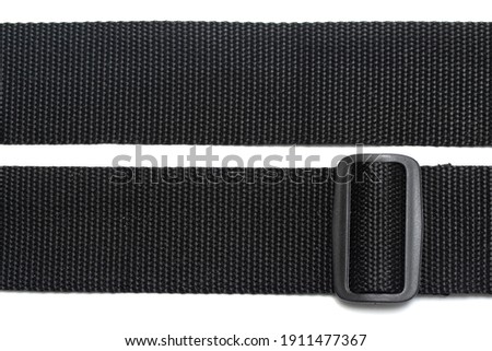 black belt made of fabric on a white background