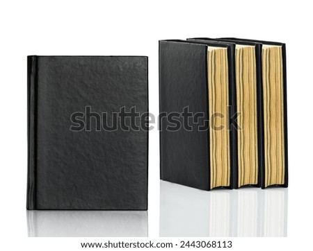 Black blank book,Closed black book is laying on white background