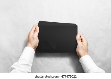 Black Blank Envelope Mock Up Holding In Hand. Empty Letter With Transparent Window Design Mockup. Message Template Presentation. Person Opening Clear Mail.