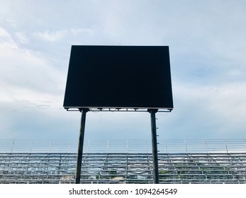 Black Blank Led Billboard For Outdoor Advertising Showcase In Sport Stadium With Blue Sky.