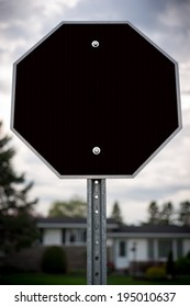 A black and blank stop-sign shaped octagonal sign with room for your text or message.