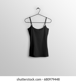 Black Blank Tank Top, Sleeveless T-shirt Mockup On Hanger, Hanging Against Empty Wall Background.