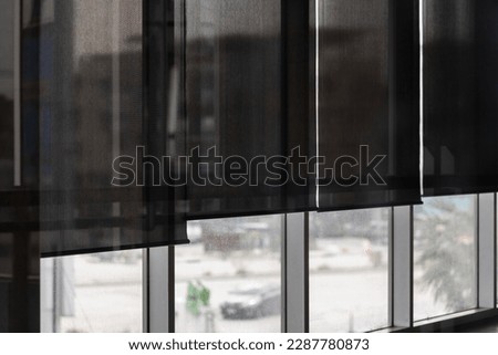 black blind curtain in the office building.