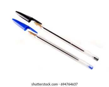 Black And Blue Ballpoint Pens On White Background