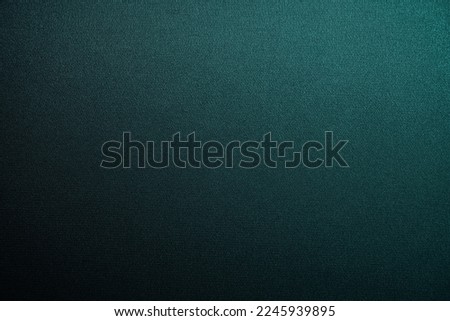 Black blue green abstract background. Gradient. Petrol color. Dark matte background with space for design. Toned fabric surface. Template. Empty.
