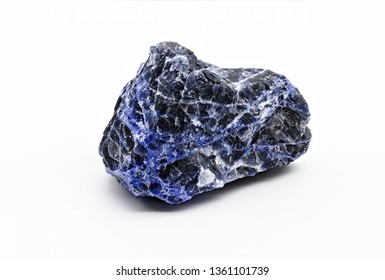 Black And Blue Veined Sodalite Mineral Stone Specimen Isolated On White Limbo Background