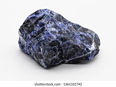 Black And Blue Veined Sodalite Mineral Stone Specimen Isolated On White Limbo Background