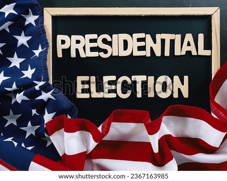 black board with wooden text and usa flag on table, 2024 presidential election wallpaper background concept