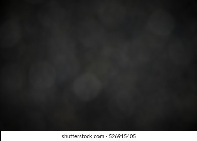 Black Bokeh Background.