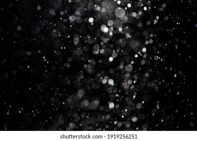 Black Bokeh Texture On Black Background