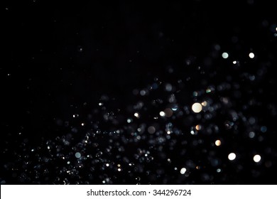 Black Bokeh Texture On Black Background