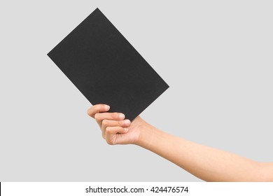 black book holding in a hands