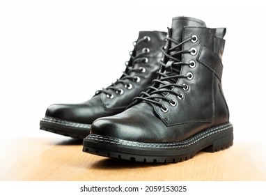 Black boots isolated on white. Steel cap leather boots isolated on white. Black combat men boot, black Military boots at Through use.