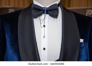 Black Bow Tie On A Blue Velvet Suit