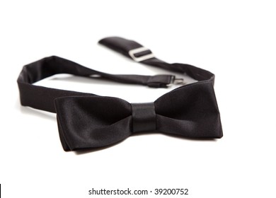 A Black Bow Tie On A White Background