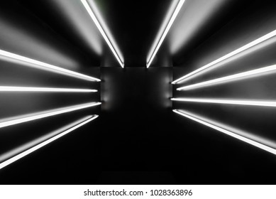 Black Box With Ten White Neon Lights: Four In The Side Walls And Two Above. Cubic Background Ideal To Insert Everything