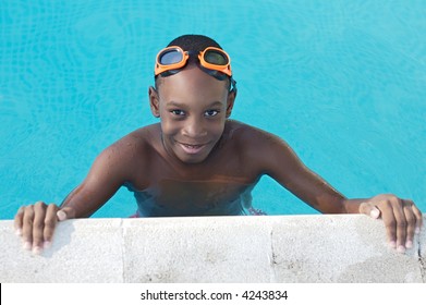 Black Boy With Glasses In The Swimming Pool