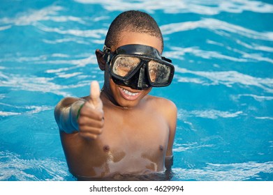 Black Boy With Glasses In The Swimming Pool