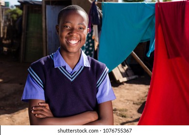 Black Boy With A Stunning Smile In A Township.