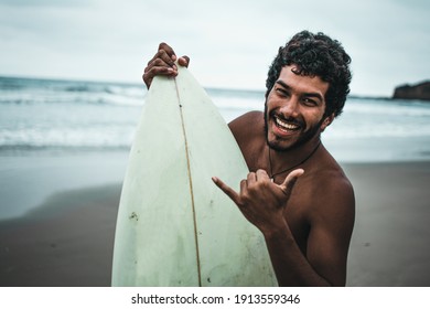 
Black Boy Surfer On The Beaches Of Montañita, Ecuador