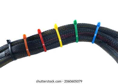 Black braided wires or Expandable Sleeving with cable ties isolated on white background.With clipping path.