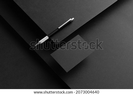 Black branding stationery mockup template, real photo, letterhead, flyer, poster, business card, envelope. Blank isolated on black background to place your design.